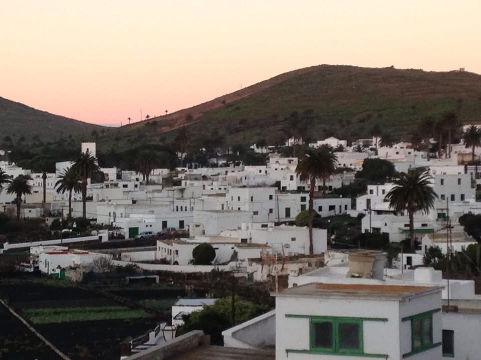 White Lanzarote village with green doors in Manrique style
